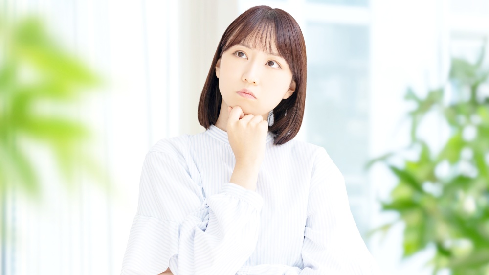 疑問を持つ女性